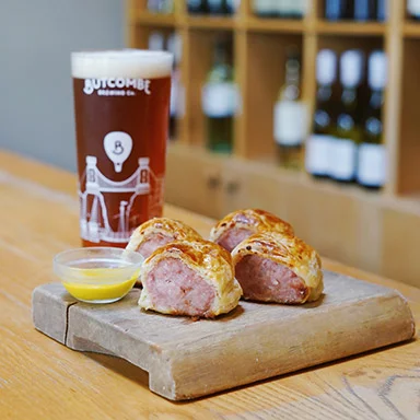 Sausage rolls and local beer